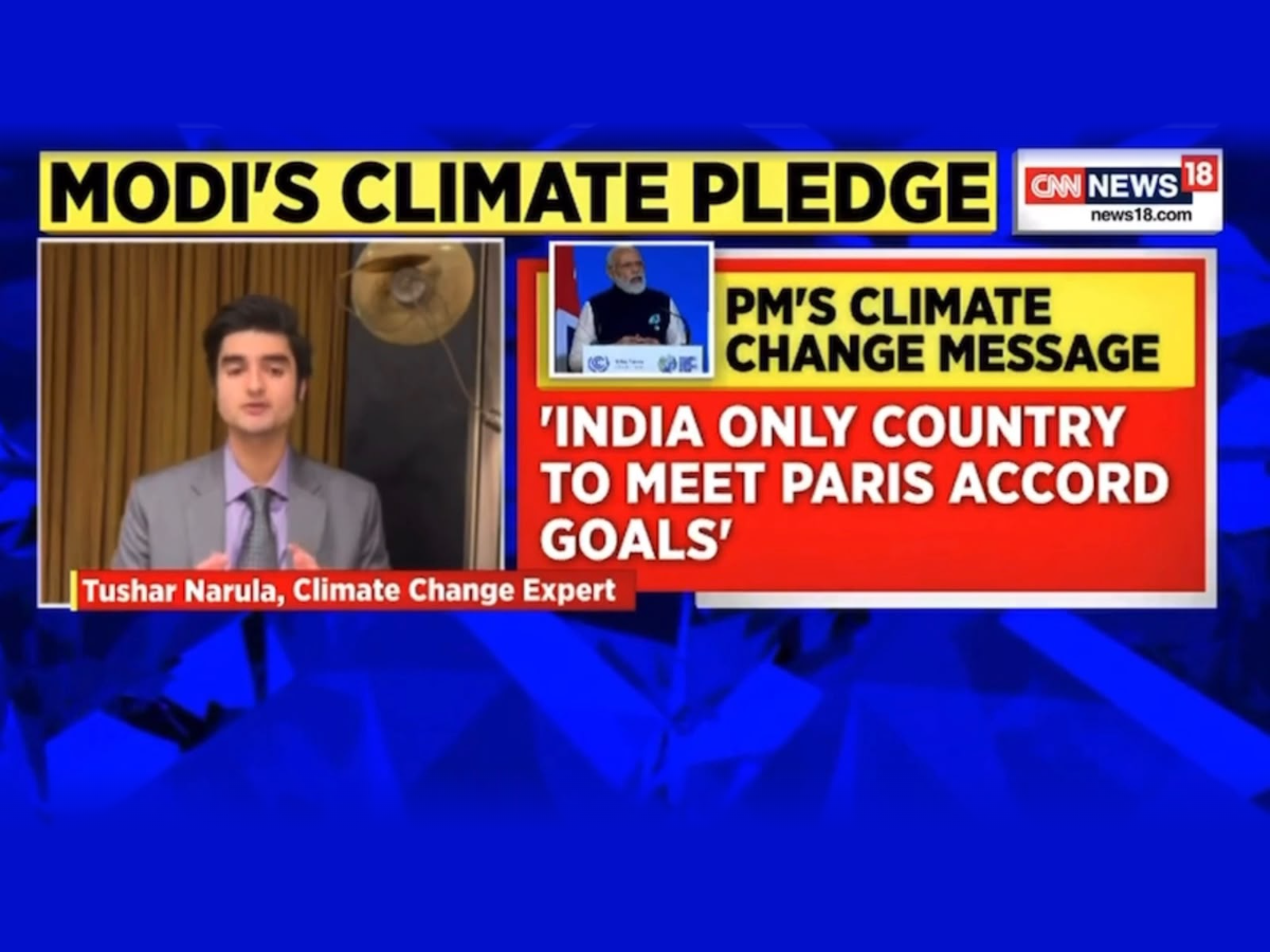 Tushar Narula on CNN-News18 as a climate change expert, discussing India's climate pledge at COP26